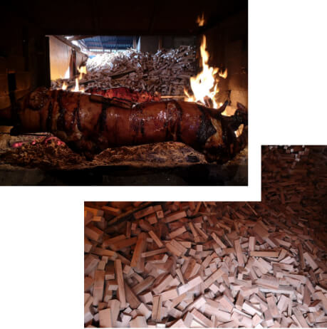 Prase se peče na bukovom drvetu.